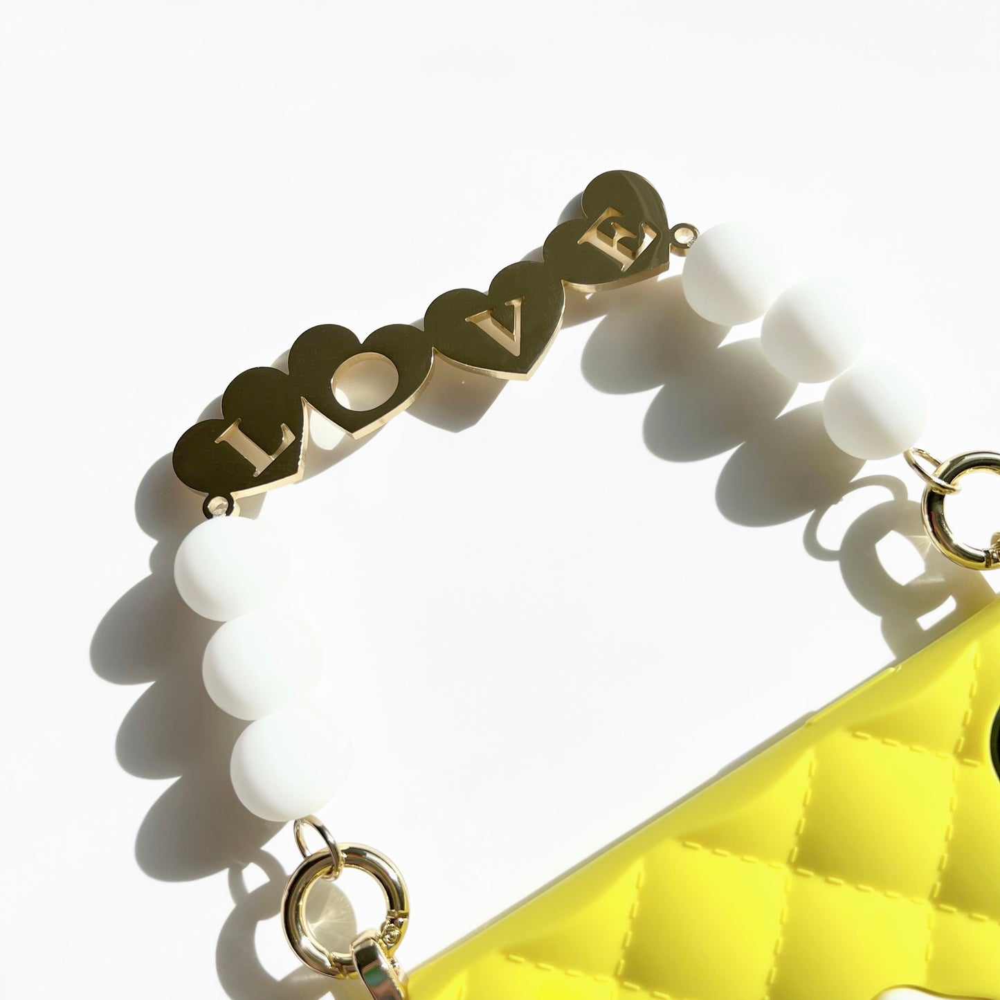 iPhone 14 Pro Max Seal Stamped Case with 'LOVE' Metal Charm Strap (Yellow)